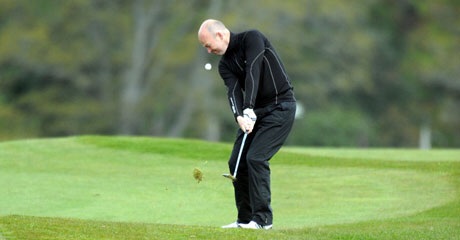 jogador de golfe